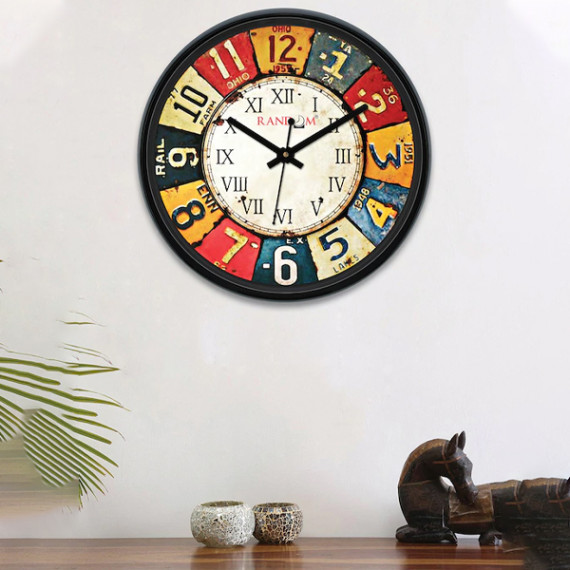 https://soulstylez.com/products/multicoloured-round-printed-analogue-wall-clock-30-cm