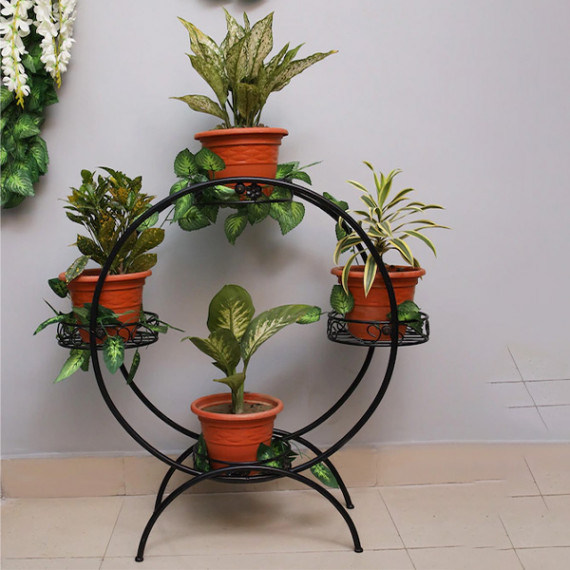 https://soulstylez.com/products/set-of-4-black-solid-metal-planters-with-round-shaped-stand