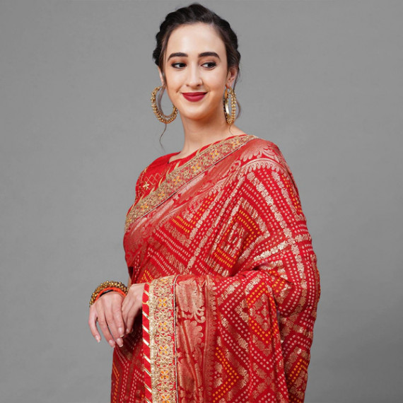 https://soulstylez.com/products/red-gold-toned-woven-design-bandhani-saree